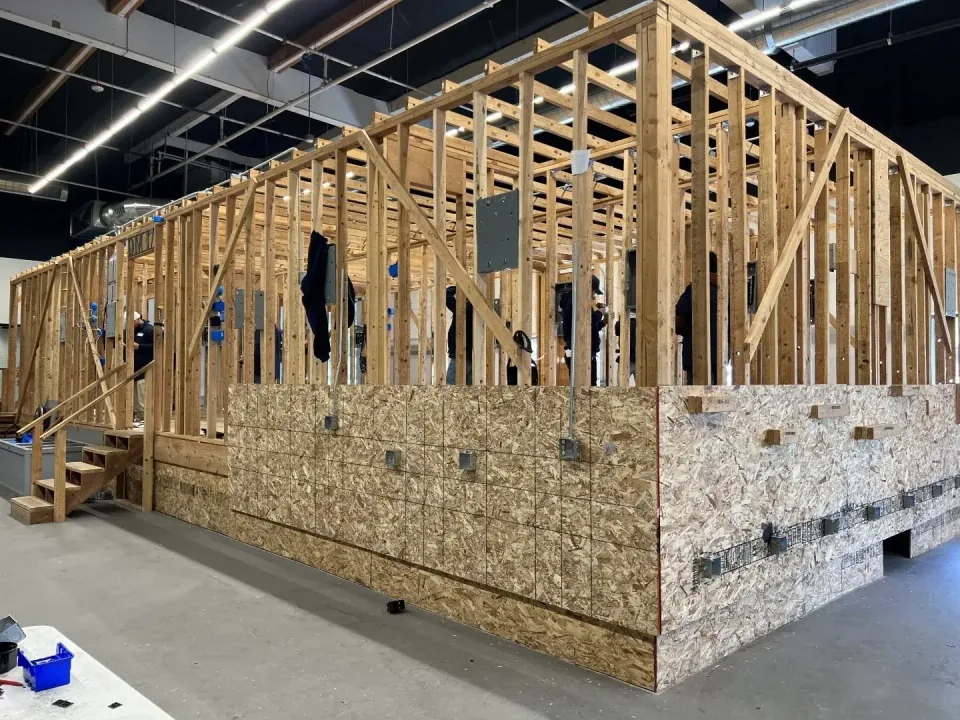 Wood framing training structure inside National Career Education's Citrus Heights campus