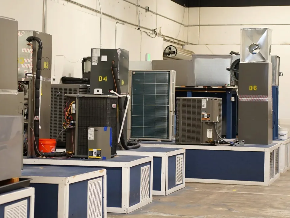 Commercial refrigeration and HVAC training equipment inside National Career Education's Citrus Heights campus