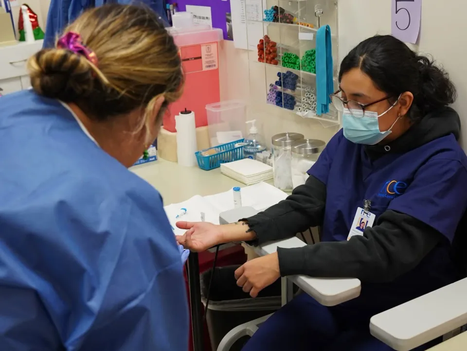 Phlebotomy training station where students practice blood draws at National Career Education's Citrus Heights campus